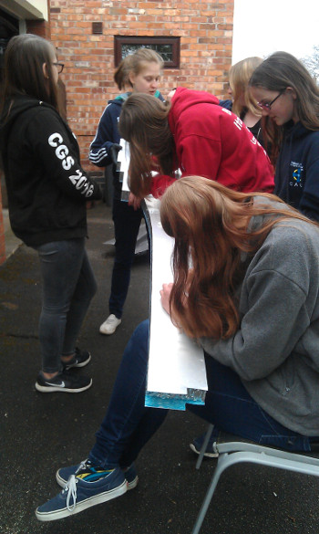 Removing the sticky tape from the paper pattern